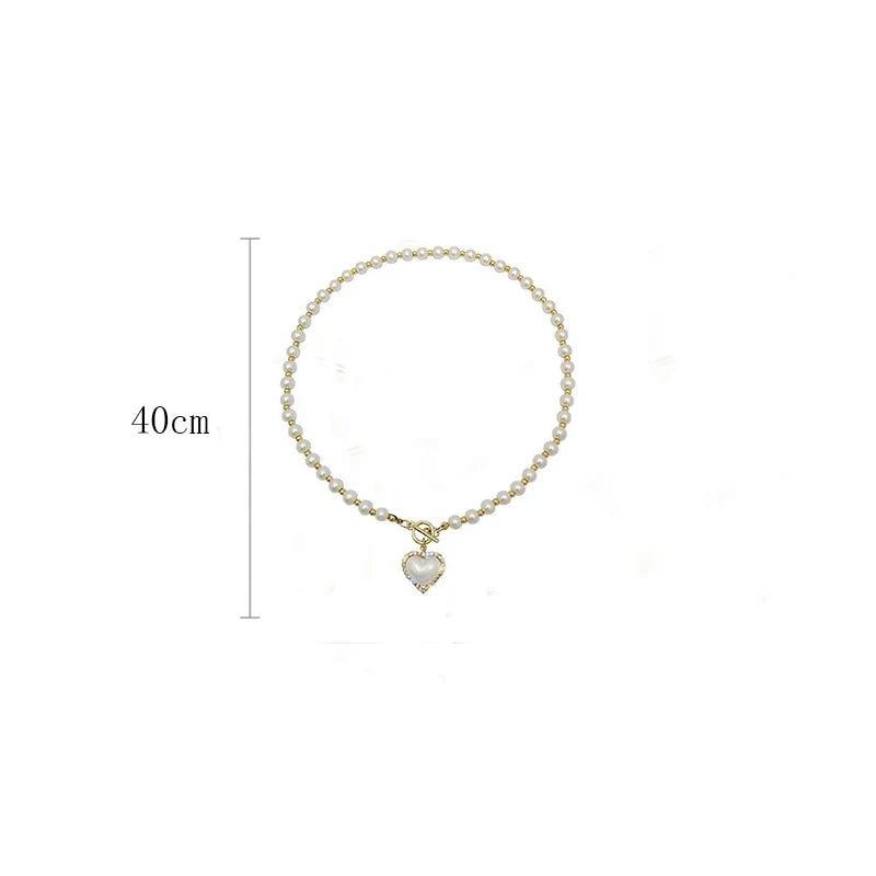 Elegant Pearl Necklace – Heart Pendant with Luxury Imitation Pearls