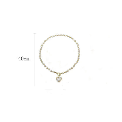 Elegant Pearl Necklace – Heart Pendant with Luxury Imitation Pearls